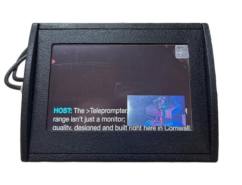 Black portable teleprompter monitor in a rugged plastic housing, showing host text on the screen with a small video thumbnail inset.
